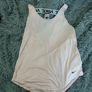orange/peach colored nike workout top